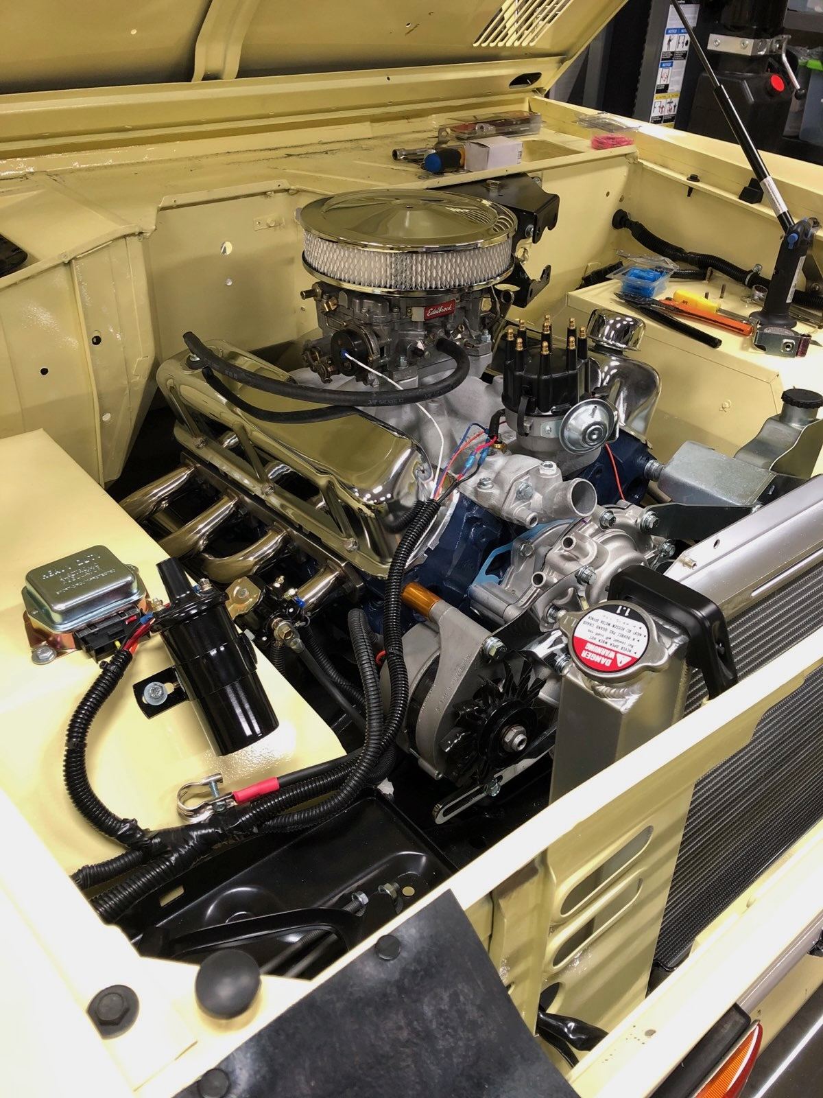 Engine bay of the restored Bronco showing the rebuilt 302 V8