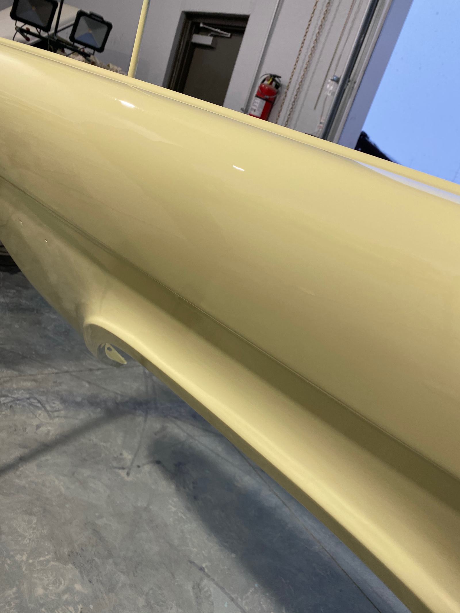 Freshly painted body panel in 1969 Ford yellow